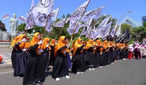Indonesia: The Call to Hijrah Towards Total Shariah and the Waves of Ar-Rayah and Al-Liwa Flags across 50 Cities